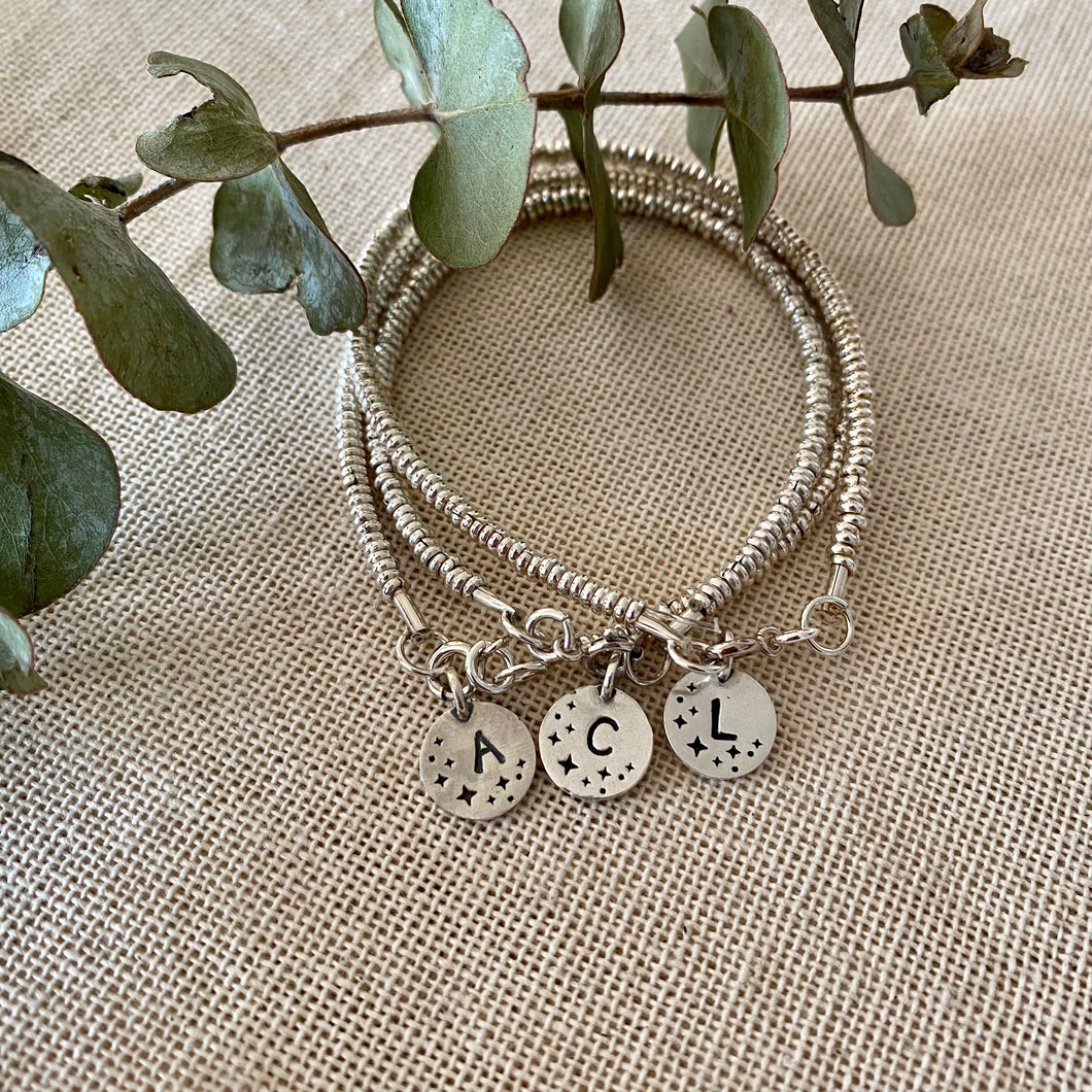 Pulsera Montreal + Medalla Inicial Estrellas
